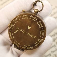 a pocket watch with the words you are written on it