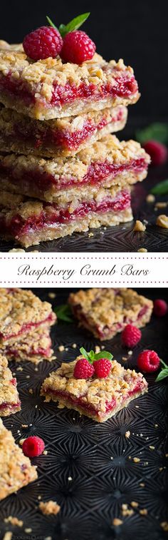 raspberry crumbled bars stacked on top of each other with fresh berries