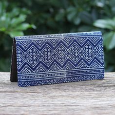 This long wallet designed by Thailand's Pimpun is perfect for when you need a little extra storage. Hand crafted from leather and cotton the wallet features a Hmong geometric pattern in navy created using a batik dyeing method. The inside is lined in black nylon and includes three compartments 12 credit card slots and one zippered pocket. Batik Dyeing, Cotton Wallet, Batik Art, Street Style Grunge, Baroque Art, Black Nylon, Artisan Craft, Extra Storage, Black Nylons