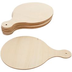 wooden ping pong paddles on white background