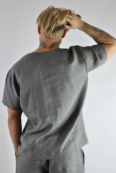 Comfort is a men's best friend so here I present you with the ultimate of comfort that men can get! Not just another boring t-shirt. It is a super quality linen top that will never allow you to sweat as the fabric absorbs body moisture better that any fabric on earth. It is made of 100% linen! Non stretchy and wrinkles beautifully as quality linen suppose to. Matching pants available separately here: https://www.etsy.com/uk/listing/866128040/mens-linen-pants-linen-tracksuit-bottoms?ref=shop_home Gray Relaxed Fit V-neck Shirt, Summer Gray Linen Top, Linen Tracksuit, Mens Linen Pants, Beach Kaftan, Pants Linen, Tracksuit Tops, Linen Tshirts, Mens Linen