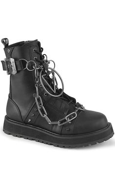 Demonia's Valor boot is a classic combat style. Added chunky chains give them that bad-boy twist. Vegan 1 1/2" (38mm) Platform Lace-Up Ankle Boot Featuring Outer Buckle Strap and Screw Studs, Spike Studs, Various O-Ring, D-Ring & Triangle Rings W/ Hanging Chain Details Inside Metal Zip Closure Rear Zip Closure U.S men's sizing - refer to size chart for more info Spiked Boots Men, Spiked Boots, Goth Shoes, Goth Boots, Demonia Shoes, Combat Style, Vegan Leather Boots, Cute Goth, Triangle Ring