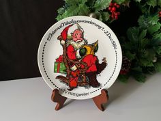 a white plate with a santa clause on it