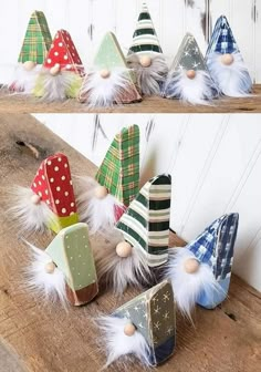 there are many different hats made out of fabric and feathers on the table, including one with white pom - poms