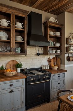 a kitchen with an oven, counter tops and cabinets in it's center island