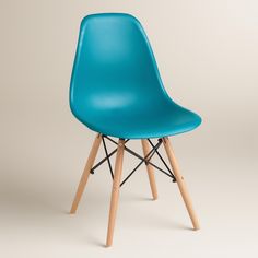 a blue plastic chair with wooden legs