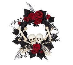 a wreath with skulls and roses on it