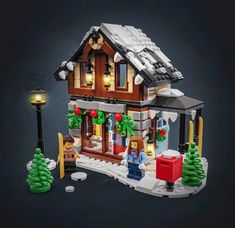 a lego christmas house with lights and decorations