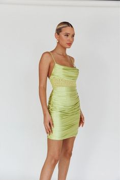 Be the life of the party in our lime Date Party Dress! This sassy satin cami mini dress comes with a cowl draped front, bodycon silhouette, and head-turning open back with lace insertion at the waist. Get ready to turn heads! 100% Polyester True to size Green Satin Dress With Spaghetti Straps For Parties, Green Mini Satin Dress For Party, Green Mini-length Satin Dress For Party, Spring Party Ruched Slip Dress, Green Satin Spaghetti Strap Dress For Night Out, Green Satin Dress With Spaghetti Straps For Night Out, Green Satin Bodycon Evening Dress, Spring Satin Backless Bodycon Dress, Green Satin Dress For Spring Party