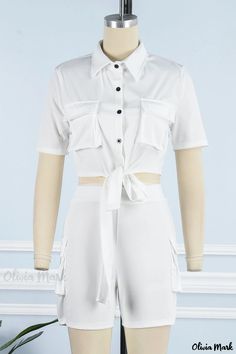 Olivia Mark - Womens Elegant White Two-Piece Casual Outfit Featuring a Stylish Solid Bandage Patchwork and Buckle-Accented Turndown Collar White Short Sleeve Sets With Pockets, White Sets With Pockets And Short Sleeves, White Fitted Jumpsuit With Tie Waist, White Fitted Jumpsuits And Rompers With Tie Waist, Fitted White Jumpsuits And Rompers With Tie Waist, Green Two Piece, 2piece Outfits, White Two Piece, Blue Two Piece