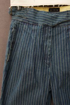 Japanese wabash striped denim washed in medium blue. High waisted pants (based on Isa pants with no pleats and longer inseam). Made in New York. Size S: waist 28" inseam 28" bottom opening 13" Size M: waist 30" inseam 28 1/2" bottom opening 13 1/2" SizeL : waist 32" inseam 28 1/2" bottom opening 14" Pre-washed Indigo Denim Bottoms, Spring Pre-washed Denim Blue Bottoms, Spring Pre-washed Straight Leg Pants, Indigo Pre-washed Straight Leg Bottoms, Striped Straight Leg Denim Pants, Striped Relaxed Fit Straight Leg Jeans, Denim Wide Leg Bottoms With Vertical Stripes, Wide Leg Denim Bottoms With Vertical Stripes, Spring Straight Leg Pre-washed Bottoms