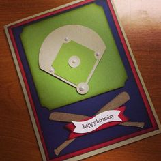 a birthday card with a baseball field and bat