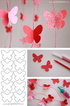 paper hearts hanging from strings with crayons and markers on the bottom left side