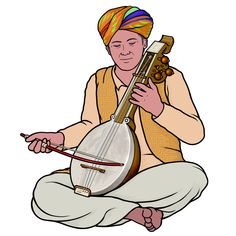 a man sitting on the ground playing a musical instrument