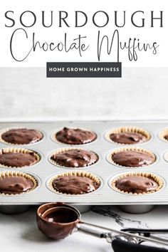 chocolate muffins in a pan with the title text overlay reads sourdough chocolate muffins home grown happiness