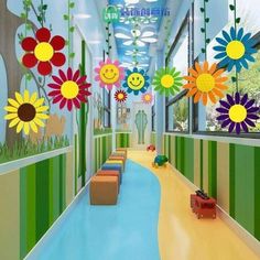 the hallway is decorated with colorful flowers and smiley faces