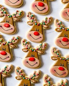 decorated christmas cookies with reindeer faces on them