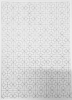 an intricate pattern is shown in the middle of a piece of paper that has been drawn on