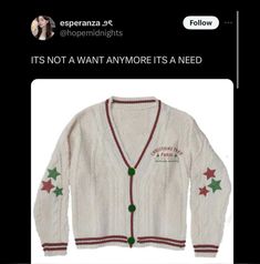 a white sweater with red and green stars on the sleeves is shown in an instagramtion