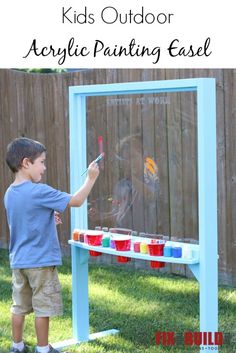 a young boy painting on an easel in the yard with text overlay that reads, kids outdoor acrylic painting easel