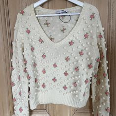 Zara Medium Cream Vintage Style Floral Embroidered Bobble V Neck Knit Sweater. Brand New Without Tags. Never Worn, Only Tried On. V-neck Winter Top With Floral Embroidery, Floral Embroidered V-neck Top For Winter, Casual V-neck Sweater With Floral Embroidery, Casual V-neck Embroidered Sweater, Cotton V-neck Sweater With Floral Embroidery, V Neck Knit Sweater, Zara Sweater, Zara Women, Colorful Sweaters