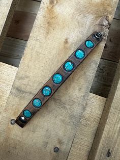 Hand Painted Leather Wrap Bracelet Never Ending Threads Brand Genuine Leather Dark Brown Leather w/ Painted Turquoise Detail Snap Closure 2 Size Adjustments - Will fit up to an 7.5" Wrist Overall 9" Long Retailed For $68 Rustic Turquoise Leather Bracelet, Blue Leather Bracelets For Festival, Blue Leather Festival Bracelets, Hand Painted Leather, Dark Brown Leather, Leather Wrap Bracelet, Leather Wraps, Wrap Bracelet, Brown Leather