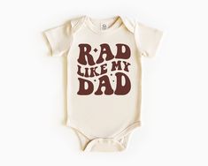 Rad Like My Dad Baby Bodysuit, Retro Toddler T-Shirt, I Love My Dad Natural Toddler Tee, Daddy's Son Baby Bodysuit !!How To Order 1-) Please, Check and Review all Photos. 2-) Select Your Product Type and Color. 3-) Select Your Product Size. 4-) Click ADD TO CART and You can go back to add more product color and text color or You can complete the checkout process. 5-) After You added your note, Please Click "Proceed to Check Out" ❤ Washing Instructions: For best results, wash inside out and lay f Funny Short Sleeve Bodysuit With Letter Print, Funny Short Sleeve Onesie With Letter Print, Funny Short Sleeve Letter Print Bodysuit, Funny Graphic Print Short Sleeve Bodysuit, Father's Day Cotton Onesie With Graphic Print, Father's Day Casual Short Sleeve Onesie, Toddler Graphics, Baby Lemur, Onesie Ideas