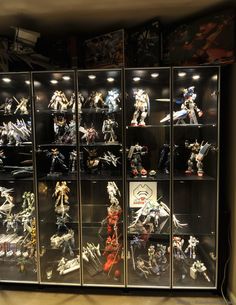 a display case filled with lots of action figures