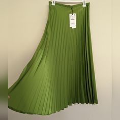 Shop chomoonlight's closet or find the perfect look from millions of stylists. Fast shipping and buyer protection. Thick and smooth, flowy satin effect pleated skirt with a beautiful sheen on every swish. Side zipper closure. S: waist: 13.5" M: waist: 14.5" Light Green Skirt, Dream Fashion, Zara New, Zara Skirts, Green Skirt, Women Skirts Midi, Pleated Skirt, Side Zipper, Green Colors