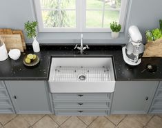 If you are looking for durability, functionality, and beauty in a kitchen sink, look no further. This gorgeous allen + roth Farmhouse Apron Front Fireclay Kitchen Sink is the answer. The fireclay kitchen sink is constructed from materials that are resistant to significantly higher levels of heat, compared to other sinks. While it is generally a good practice not to place hot pots and pans directly into your sink, the fireclay material can withstand a good amount of heat without causing damage. In addition, the non-porous finish on this fireclay sink provides resistance to scratches, chips and many stains. allen + roth Farmhouse Apron Front 30-in x 18-in White Fireclay Single Bowl Kitchen Sink Stainless Steel | MC-2043018T Gray Farmhouse Sink With White Cabinets, Farmhouse Apron Sink The Home Depot, Black Apron Sink White Countertop, Stainless Steel Farmhouse Sink Lowe's, 33" Apron Sink, Kitchen Sink Stainless Steel, Farmhouse Aprons, Allen Roth, Fireclay Sink