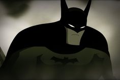 the batman animated character is staring at something