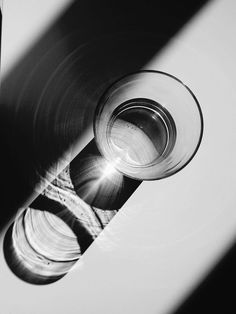 the light is shining through an object in black and white stock - fotor