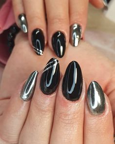 Black and silver nails are the perfect look for a party season, holiday season or something extra special to give your nails that sparkle for the weekend. Silver And Black Nails Ideas, Black Silver Gel Nails, Black And Metallic Nails, Chrome And Black Nails, Black And Silver Nails Short, Nails Black And Silver, Black And Silver Nail Art, Black Silver Nails Design