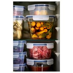 an open refrigerator filled with lots of food and storage containers next to other foods in plastic containers