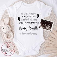 a baby's bodysuit with the words, 10 little fingers is no little toes and we think it's time that everybody knows baby smith is due november