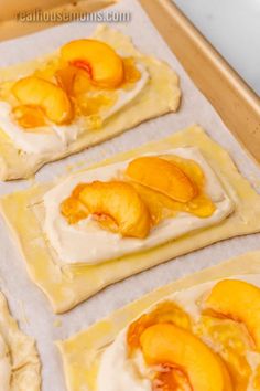 peaches and cream on top of dough in the shape of pies, ready to go into the oven