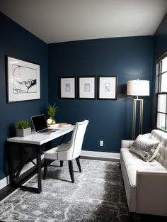 a living room with blue walls and pictures on the wall, a white couch and table