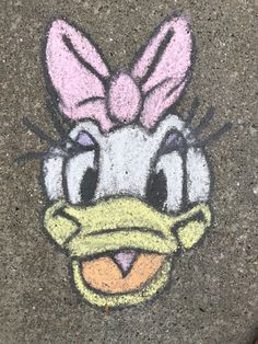 a drawing of a cartoon duck with a bow on it's head is shown