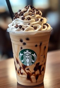 a starbucks drink with whipped cream and chocolate chips