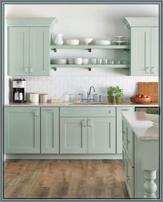 (ad) Concrete-look counters, genderless cabinets, and greenery  urban jungle Decors summative like exotic birds can bring your kitchen to life. Breathe ventilate into your ... Robins Egg Blue Kitchen, Green Kitchen Designs, Model Dapur, Home Depot Kitchen, Cottage Kitchen Design, Kabinet Dapur, Green Kitchen Cabinets, Modern Kitchen Cabinets, Kitchen Cabinet Colors