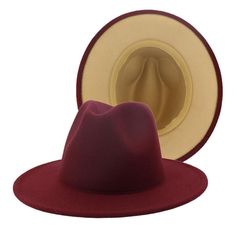 This sophisticated and chic maroon and beige fedora is the fashion statement for any event, any location, and any time of the year. You are sure to turn heads and receive plenty of compliments because of the polished look these fedoras give. At upscale events, or even more casual events, you'll be the center of attention. Description: 65% Cotton, 35% Polyester Unisex,: For Both Men and Women Size: One Size (22.1 in) Adjustable headband Burgundy Fedora Hat Outfit, Burgundy Fedora, Fedora Hat Outfit, Hat Outfit Men, Fedora Fashion, Statement Hat, Hat Outfit, Flat Brim Hat, Fedora Hat Women