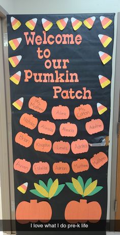 a door decorated with candy corn and pumpkins for the classroom to welcome their students