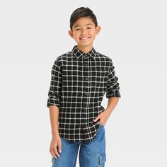 Add timeless style to your child's wardrobe with this Long-Sleeve Flannel Button-Down Shirt from Cat & Jack™. Made from 100% cotton, this lightweight flannel shirt is adorned with a checkered pattern. With a collared neck, full-length button-down placket, chest patch pocket and long sleeves with buttoned cuffs, this regular-fit shirt infuses smart vibes into your ensemble. Plus, the below-waist length and shirttail hem make it great to wear tucked, untucked and layered with pants, shorts, leggin Flannel Tops, Kids Clothes Boys, Long Sleeve Flannel, Long Sleeve Plaid, Boys Long Sleeve, Checkered Pattern, Pair Of Pants, Waist Length, Plaid Flannel