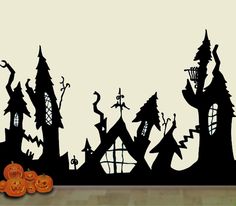 a halloween scene with pumpkins in front of it and an image of a castle