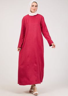 This Slip Dress boasts a loose, A-shape cut for a comfortable and flattering fit. Its long maxi sleeves add a touch of elegance, while the lightweight fabric allows for easy movement. Perfect for any throw over abaya or as a slip dress under sheer garments or as a basic dress on its own, this dress is a must-have addition to your wardrobe. Expertly designed for versatility and comfort, the Dark Pink Kira loose slip dress is a staple for any modest fashion store. With its A-shape cut, it offers a Spring Long Sleeve Maxi Dress With Side Slits, Oversized Long Sleeve Maxi Dress For Fall, Casual Long Sleeve Abaya With Modesty Panel, Casual Long Sleeve Dresses With Side Slits, Plain Long Sleeve Maxi Dress For Fall, Modest Maxi Dress With Modesty Panel, Spring Casual Maxi Length Abaya, Relaxed Fit Maxi Dress With Pockets And Long Sleeves, Relaxed Fit Long Sleeve Maxi Dress With Pockets