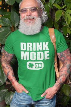 St Patrick's Day T-Shirt Drinking Irish Pub Tee Shirt * * * * * * * * * * * * * * * * * * * * * * * * * * * * * * * * * * * * * * * * * * * * * * * * * * * * * * * * * * * *  Next Level Men's Premium Fitted High Quality Short-Sleeve.  This super-soft crew neck t-shirt is instantly loved by all who wear it. * 100% combed ring-spun cotton high-end jersey * 4.3 oz. * fabric laundered for reduced shrinkage * 32 singles for extreme softness * 1x1 baby rib-knit set-in collar #### UNISEX ADULT SIZING CHART #### For the size chart please check second image SHIPPING: This item will be shipped within 1-3 days after the payment is received.  Delivery time for International orders is 2-3 weeks plus our processing time. Delivery to Canada takes 1-2 weeks. Green Short Sleeve Shirt With Funny Text, St. Patrick's Day Cotton Crew Neck Tops, Funny Green Crew Neck Shirt, Cotton Crew Neck Top For St. Patrick's Day, St. Patrick's Day Crew Neck T-shirt, Casual Green T-shirt For St. Patrick's Day, Casual Pre-shrunk T-shirt For St. Patrick's Day, Green Crew Neck Shirt With Funny Text, Green Short Sleeve Shirt For Father's Day