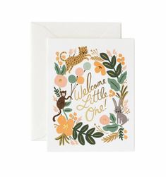 a greeting card with an illustrated image of cats, flowers and leaves on the front