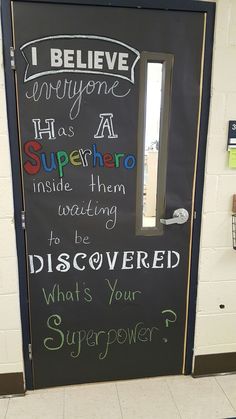 a door with writing on it that says i believe everyone has a superhero inside them waiting to be discovered what's your super power?