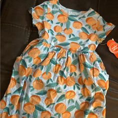 Pretty Orange Print Toddler Dress For Summer . Dress Has Pockets .Size 3t Casual Summer Twirl Dress For Playwear, Playful Orange Sleeveless Dress, Casual Summer Dresses For Playwear, Casual Summer Playwear Dresses, Casual Twirl Dress For Playtime, Casual Short Sleeve Twirl Dress For Dress-up, Casual Cotton Twirl Dress For Playwear, Playful Orange Cotton Dress, Playful Orange Dress For Spring