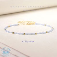 Angelite Minimalist Bracelet Light Blue Gemstone Delicate Beaded Skinny Bracelet Yoga Crystal Dainty Bracelet Adjustable 2MM Tiny Bead Stone Bracelet Gift Material : Angelite Stone, Natural Stones, Natural Crystal, Raw Stone Quality: AAA+ Length: fit for 6.3 ~ 7.3 inches wrists Beads size: 2mm Size: Adjustable It is good gift for your friends, families + Free gift pouch  Your bracelet will arrive beautifully packaged in a gift bag ,The bracelet is adjustable.  All beads are carefully selected. It is a unique and meaningful gift for yourself or someone special. Perfect cool gift that anyone will love! These happy bracelet can't help but make you smile! Add to cart today! this is one you might want to keep yourself, but would make a wonderful gift to anyone.    As you can see this is a real Elegant Friendship Bracelets With Colorful Beads, Dainty Blue Bracelets With Faceted Beads, Minimalist Blue Beaded Bracelets, Handmade Delicate Blue Bracelets, Elegant Blue Friendship Bracelets With Colorful Beads, Elegant Blue Beaded Friendship Bracelets, Elegant Adjustable Beaded Crystal Bracelet, Elegant Adjustable Light Blue Crystal Bracelet, Elegant Light Blue Adjustable Crystal Bracelet